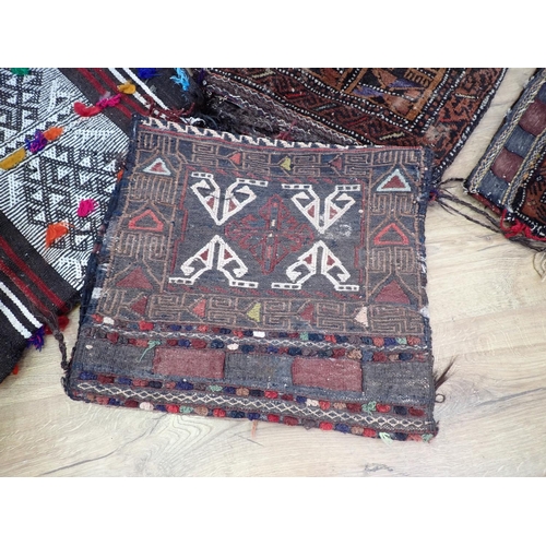 626 - Five North African carpet Saddle Bags and a Cushion