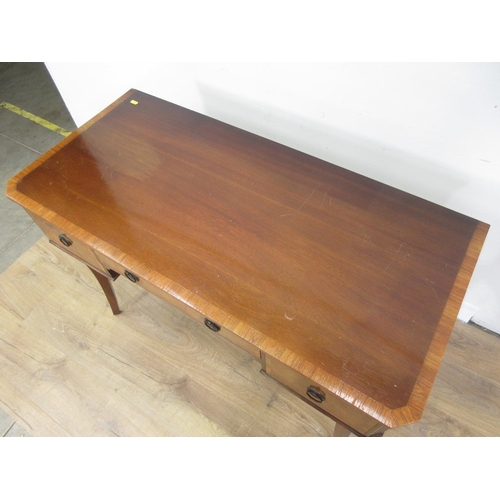 629 - A 20th Century mahogany veneered Dressing Table fitted three drawers on square cut supports 3ft 6in ... 