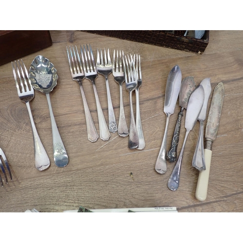 630 - An oak Canteen of Cutlery, another Canteen of stainless Cutlery and a box of Postcards