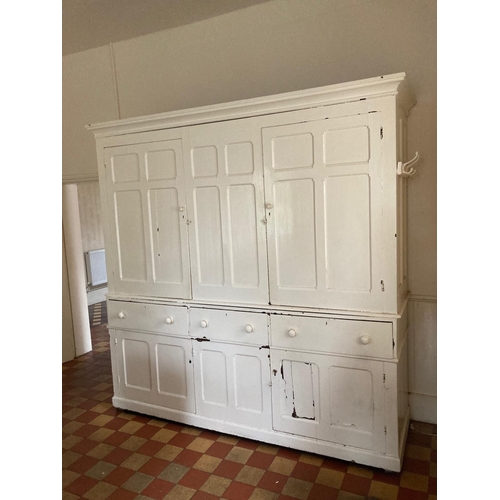 639 - A 19th Century white painted pitch pine Housekeeper's Cupboard fitted four cupboard doors to upper s... 