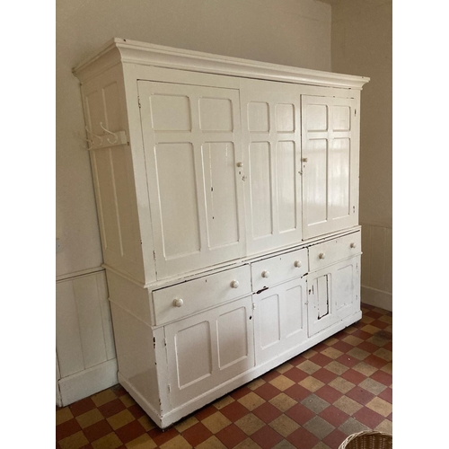 639 - A 19th Century white painted pitch pine Housekeeper's Cupboard fitted four cupboard doors to upper s... 