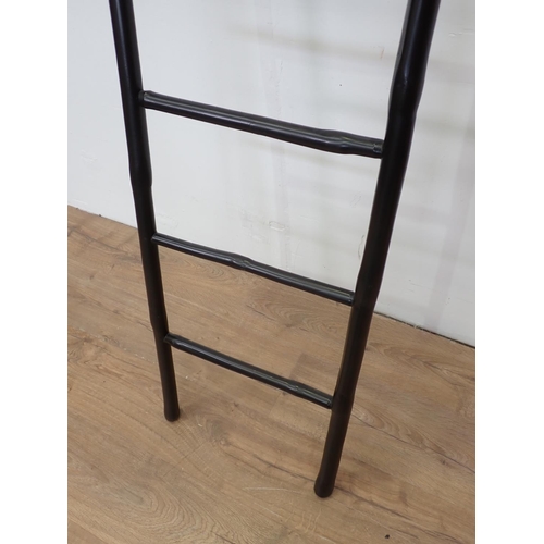 643 - A black painted wooden Ladder 7ft 1in L x 1ft 4in W