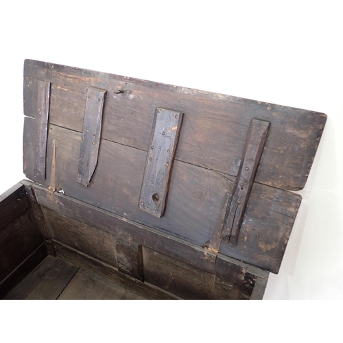 65 - A 17th Century oak Coffer with tulip carved two panel front 3ft 5in W x 2ft 1in H