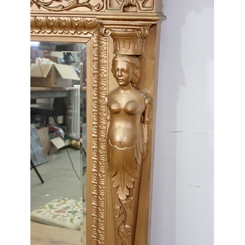 668 - A gilt framed Wall Mirror with mermaids and urn surmount 4ft 6in H x 3ft 2in W