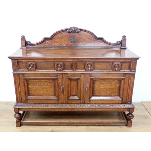 673 - A moulded oak Sideboard with raised back fitted two frieze drawers above pair of cupboard doors 5ft ... 