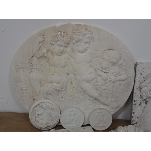 678 - A quantity of plaster Plaques and a Wall Pocket