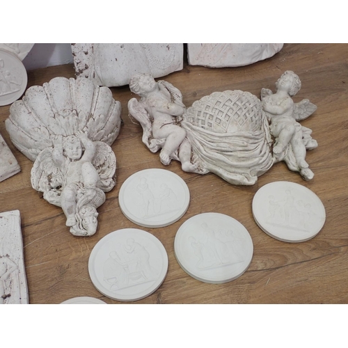 678 - A quantity of plaster Plaques and a Wall Pocket