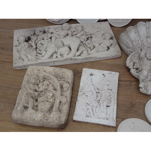 678 - A quantity of plaster Plaques and a Wall Pocket