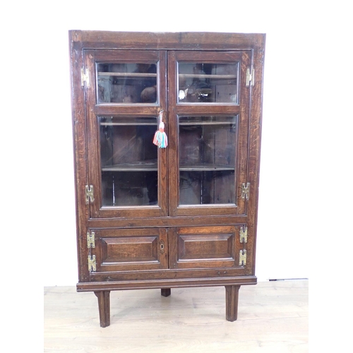 679 - An antique oak and glazed standing Corner Cabinet 4ft 9in H x 3ft W