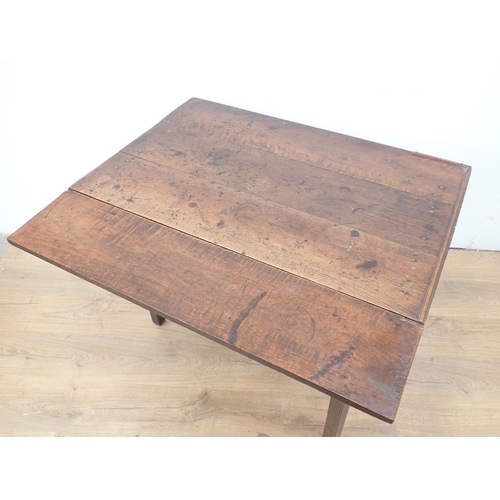 72 - An 18th Century oak single fall flap Table mounted upon square cut supports 3ft 1in W x 2ft 4in H