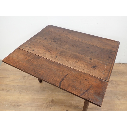 72 - An 18th Century oak single fall flap Table mounted upon square cut supports 3ft 1in W x 2ft 4in H