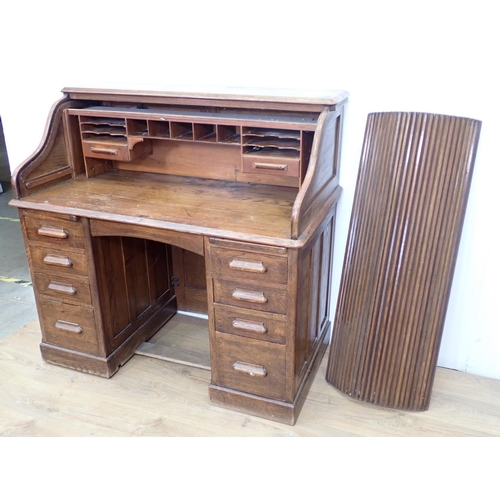 75 - A 20th Century oak tambour fronted Desk 4ft W x 3ft 10in H