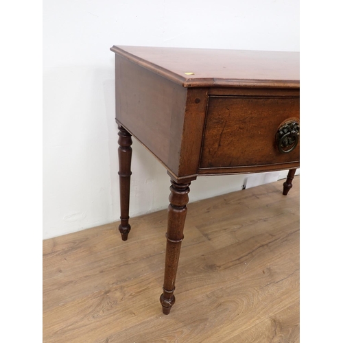 78 - A 19th Century mahogany bow fronted Serving Table fitted single frieze drawer and mounted upon turne... 