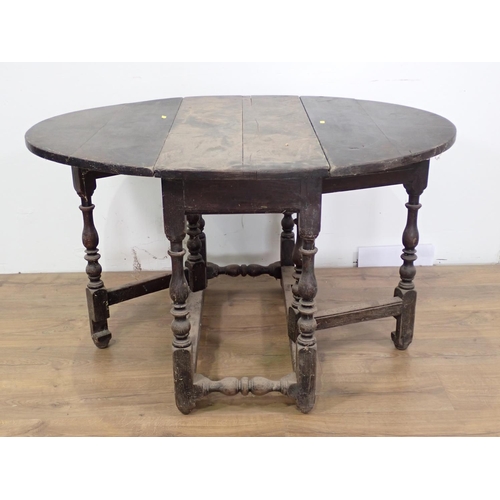 80 - A late 17th/early 18th Century oak Gateleg Table on baluster turned supports 3ft 1in W x 2ft 4in H