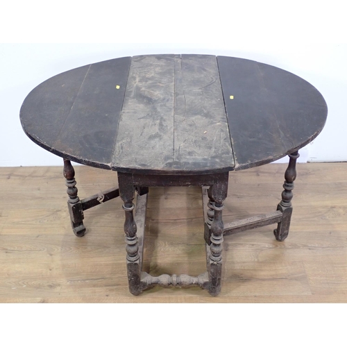 80 - A late 17th/early 18th Century oak Gateleg Table on baluster turned supports 3ft 1in W x 2ft 4in H