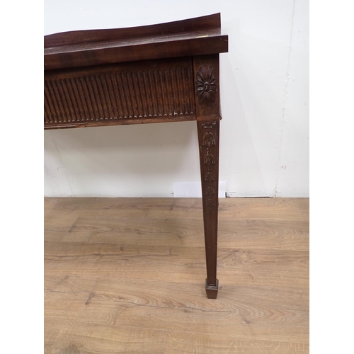 81 - A 19th Century mahogany Serving Table with nulled frieze mounted upon swag decorated square cut tape... 