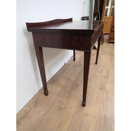 81 - A 19th Century mahogany Serving Table with nulled frieze mounted upon swag decorated square cut tape... 