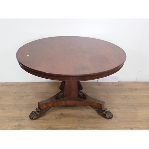 93 - A 19th Century mahogany Breakfast Table on paw feet 4ft D x 2ft 4in H