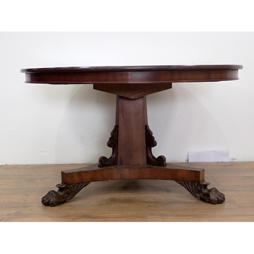 93 - A 19th Century mahogany Breakfast Table on paw feet 4ft D x 2ft 4in H