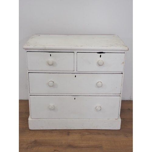 95 - A Victorian white painted pine Chest of two short and two long drawers on plinth base 3ft 1in W x 3f... 