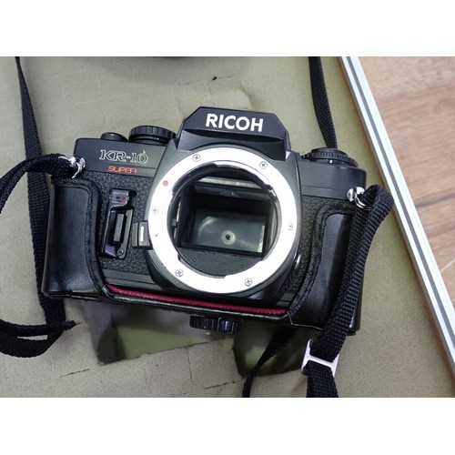 294 - A Ricoh KR-10 super 35mm Camera with Zeiss Jena3.5/135 lens, a Rikenon 2/50mm lens and a Sunagor 2.8... 