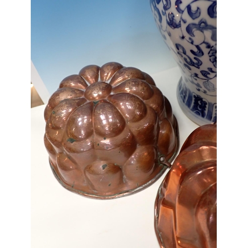 108A - A blue and white Jar and cover, another similar Table Lamp, a quantity of copper Jelly Moulds, a qua... 