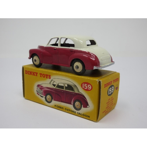 201 - A boxed Dinky Toys No.159 maroon and cream Morris Oxford Saloon