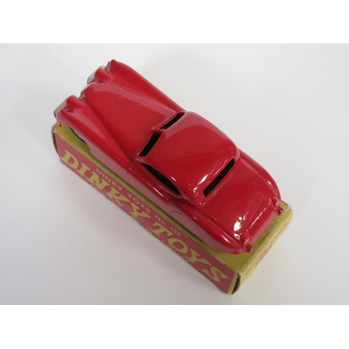 210 - A boxed Dinky Toys No.157 red Jaguar XK120 with spun hubs