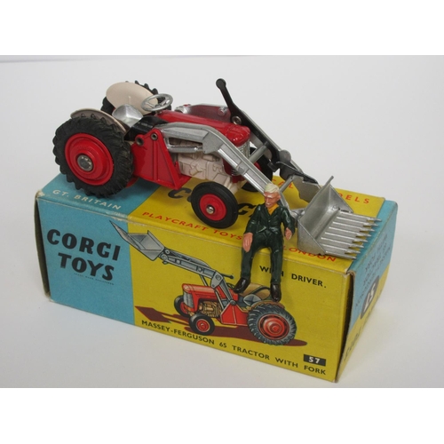 222 - A boxed Corgi Toys No.57 Massey-Ferguson Tractor with fork