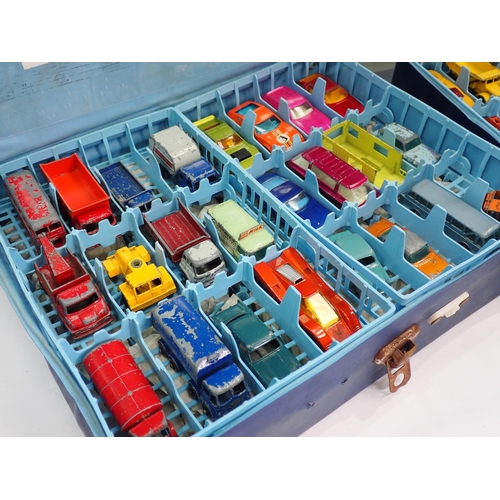 275 - Two Matchbox Carry Cases containing complete trays of assorted Matchbox and Husky diecast Vehicles