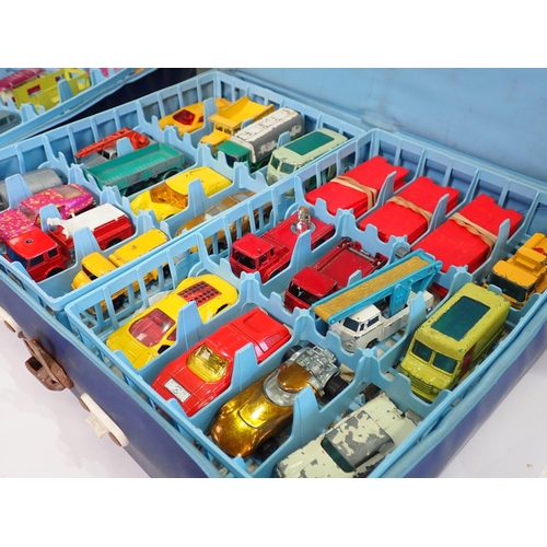 275 - Two Matchbox Carry Cases containing complete trays of assorted Matchbox and Husky diecast Vehicles