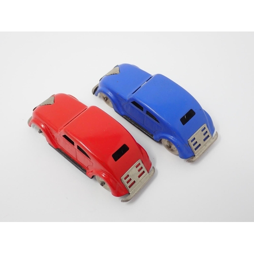 278 - Two D.R.G.M GNOM Lehman tinplate Cars, one in blue one in red