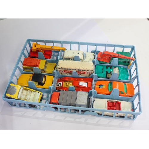 302 - A Matchbox Carry Case containing two complete trays of playworn Matchbox Models