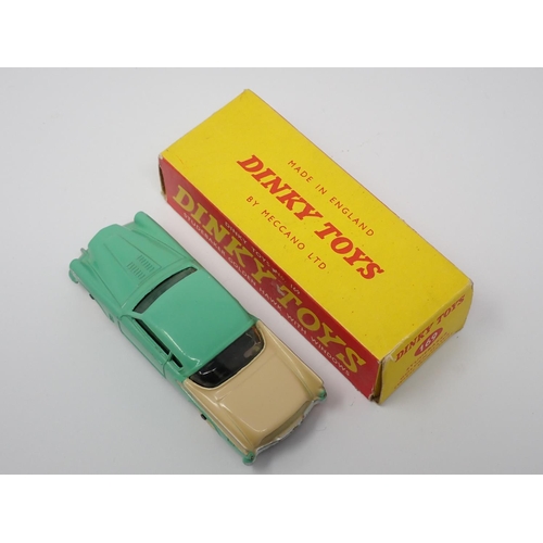 311 - A boxed Dinky Toys No.169 green and cream Studebaker Golden Hawk