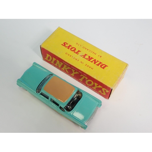 326 - A boxed Dinky Toys No.192 tan and turquoise De Soto Fireflite Sedan with suspension