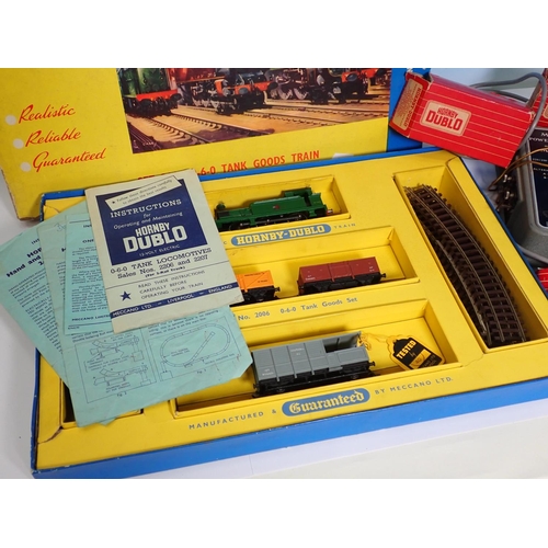 330 - A boxed Hornby-Dublo 2006 Goods Set, a boxed low sided Wagon, boxed Switch Pont, Controller, etc.