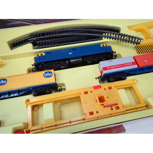 335 - A boxed Tri-ang Hornby oo gauge RS.602 Freightliner Set, a boxed Hornby 00 gauge B.R diesel Railcar ... 