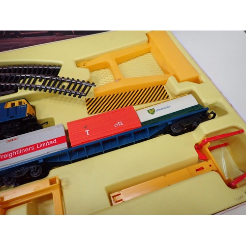 335 - A boxed Tri-ang Hornby oo gauge RS.602 Freightliner Set, a boxed Hornby 00 gauge B.R diesel Railcar ... 