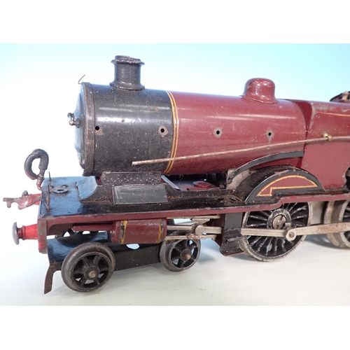 338 - A Hornby 0 gauge clockwork No.2 Special 4-4-0 Locomotive in L.M.S maroon livery (lacking one set of ... 