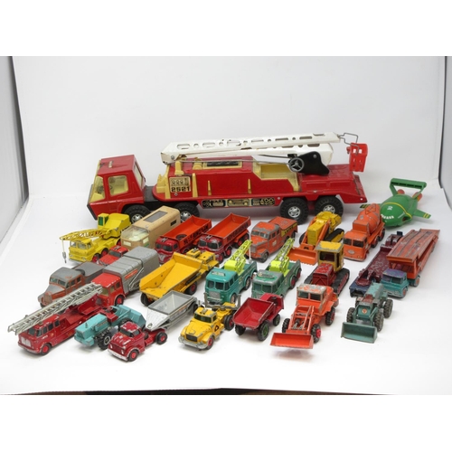 349 - A box of play worn diecast Matchbox and other models and a tinplate Crane