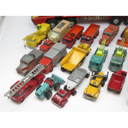 349 - A box of play worn diecast Matchbox and other models and a tinplate Crane