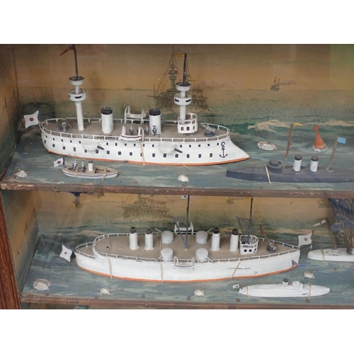 357 - A framed set of shelves with a diorama on each level of Ships with printed backgrounds 2ft 3 1/2in W... 