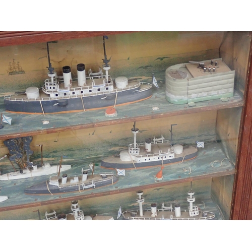 357 - A framed set of shelves with a diorama on each level of Ships with printed backgrounds 2ft 3 1/2in W... 