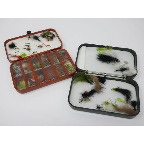 385 - A Hardy Neroda green Fly Box containing a quantity of modern Flies and another Hardy plastic Fly Box... 