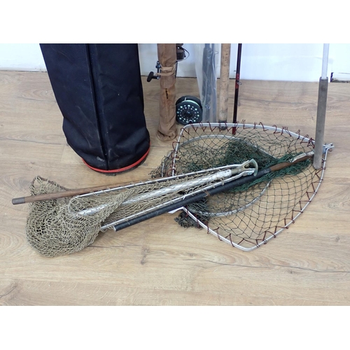 392 - A Rod Bag containing a quantity of modern Rods and Reels (some A/F)