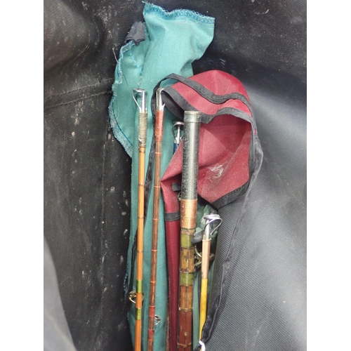 392 - A Rod Bag containing a quantity of modern Rods and Reels (some A/F)