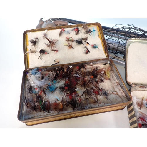 434 - A box containing two small Wheatley Fly Tins and various tins of Flies and other assorted Tackle,  H... 