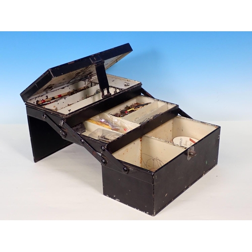 439 - A black japanned cantilever Tackle Box containing a quantity of Minnows