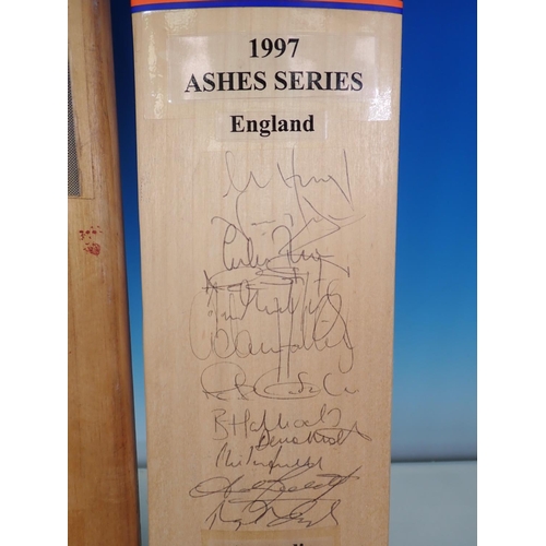 493 - A Gunn & Moore Cricket Bat signed by 1997 England Ashes Series Team, a Duncan Fearnley Bat signed by... 