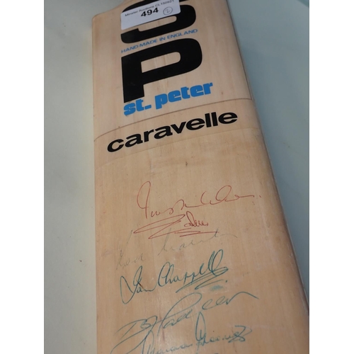 494 - A Stuart Surridge Cricket Bat signed by the 1956 Australia Team and a St. Peter Bat and an Internati... 